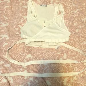 Zara white tank top and string crossing